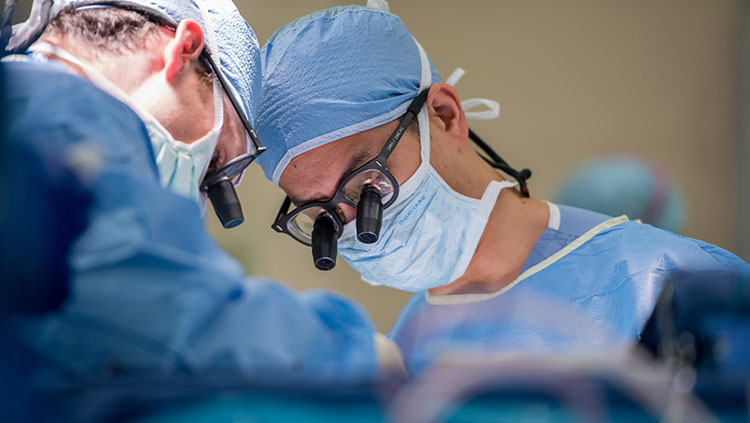 Edward Chang performing surgery