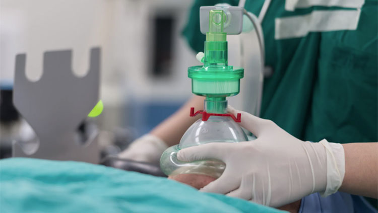 Hands assiting anesthesia for surgery 