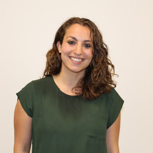 Photograph of Jesse Klein in a green shirt