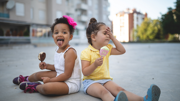 two children eating ice cream