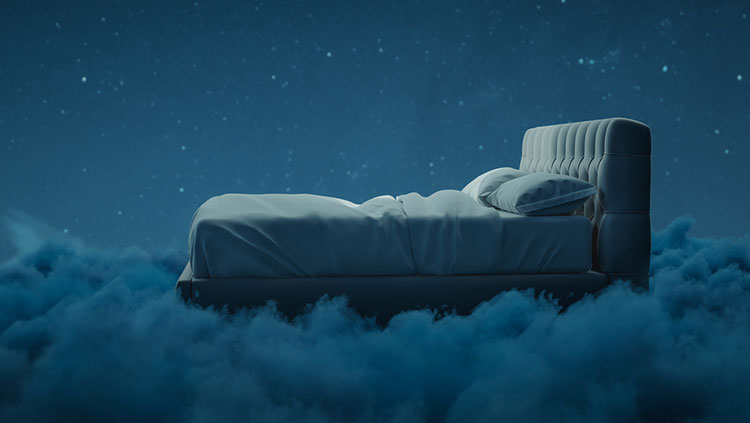 Bed floating on clouds under a starry sky